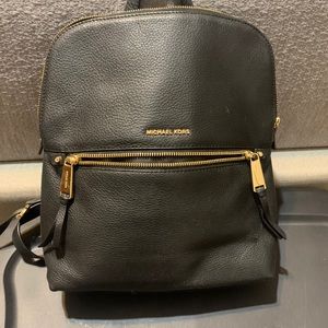 Michael Kors soft black leather backpack.